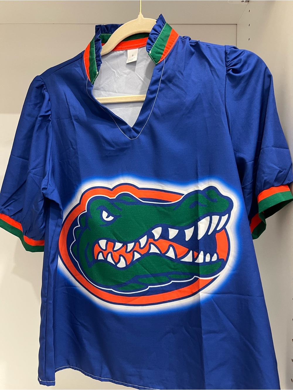 Women's Blue Graphic V-Neck Top with Green & Orange Team Logo